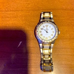 Mens jean paul watch,water proof,it was resized so it’s a little smaller